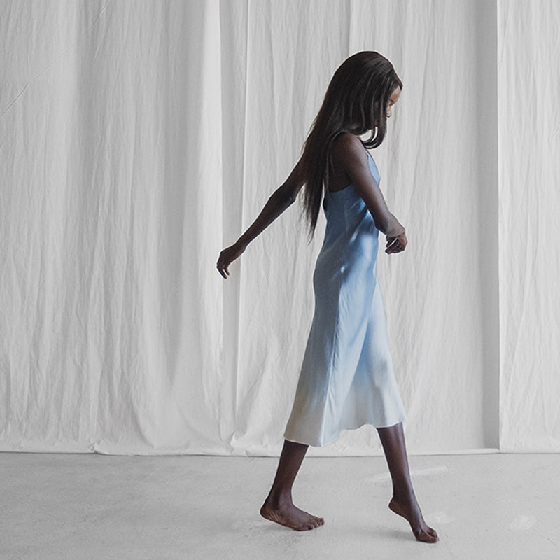 Model wearing 'A Dip in the Ocean' Ombre Silk Slip Dress